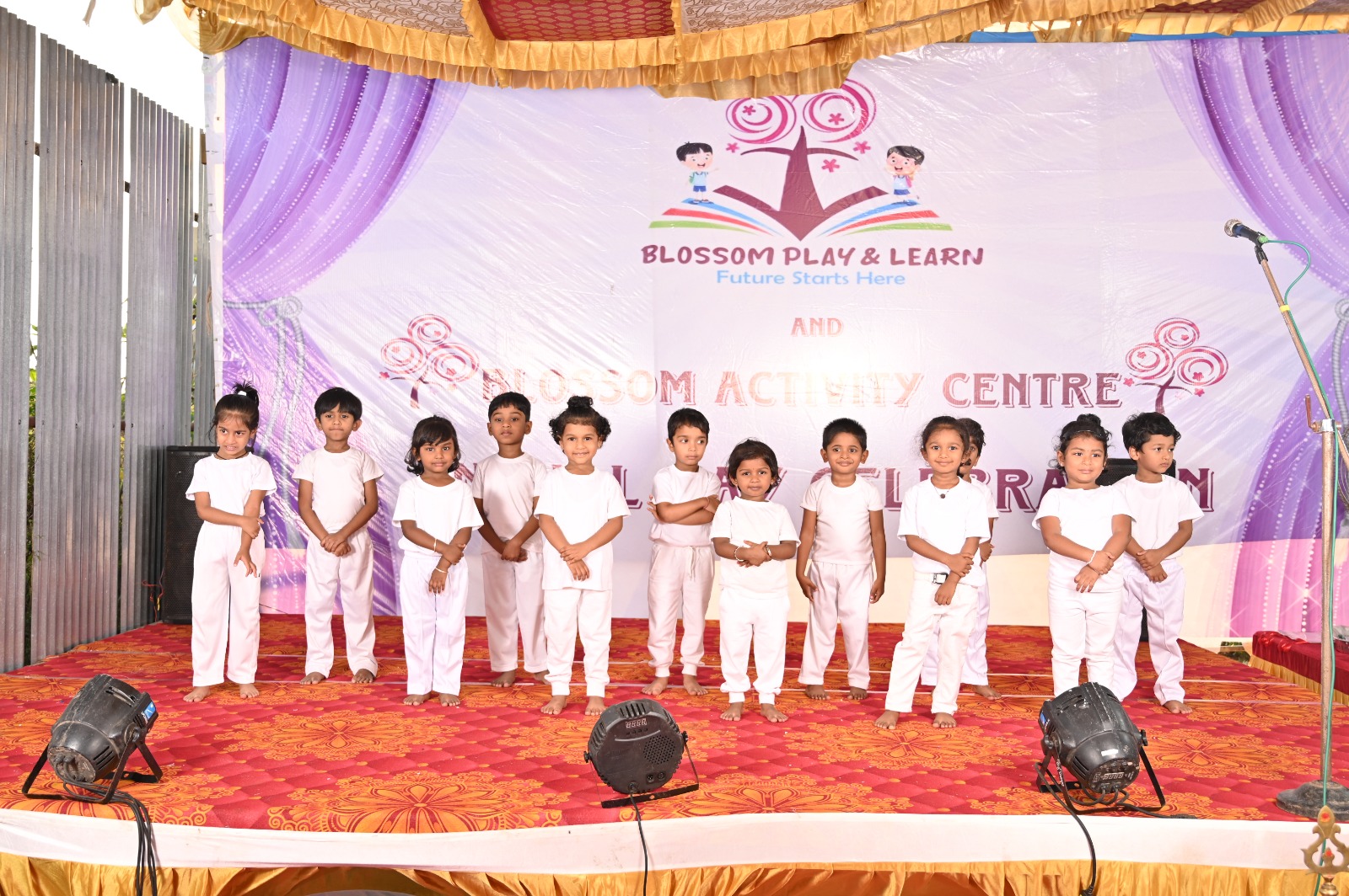 Teacher and children learning at Blossom Play & Learn